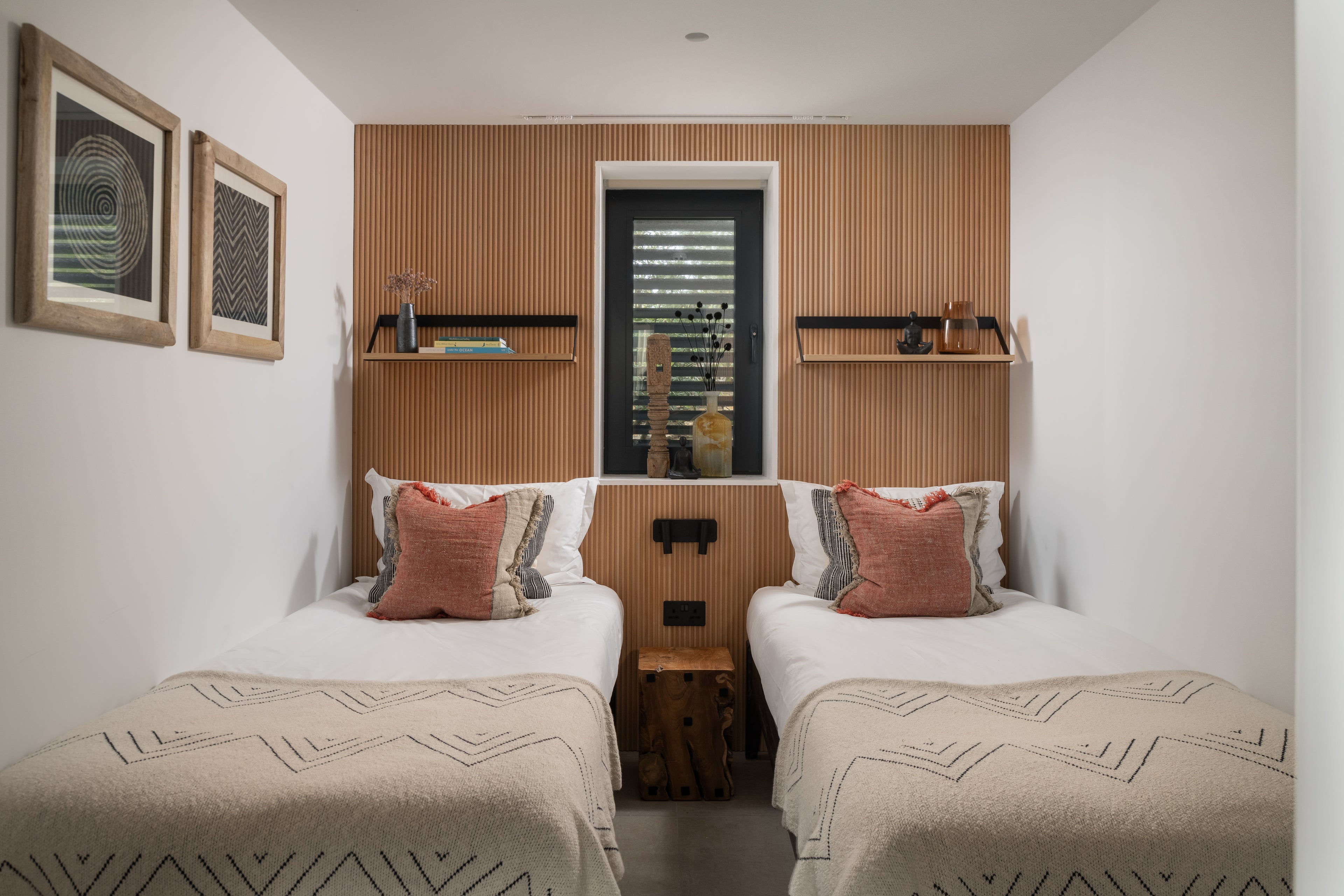 Twin bedroom of two single beds in contemporary Japandi styled bedroom with curved oak fluted wall panels by Element